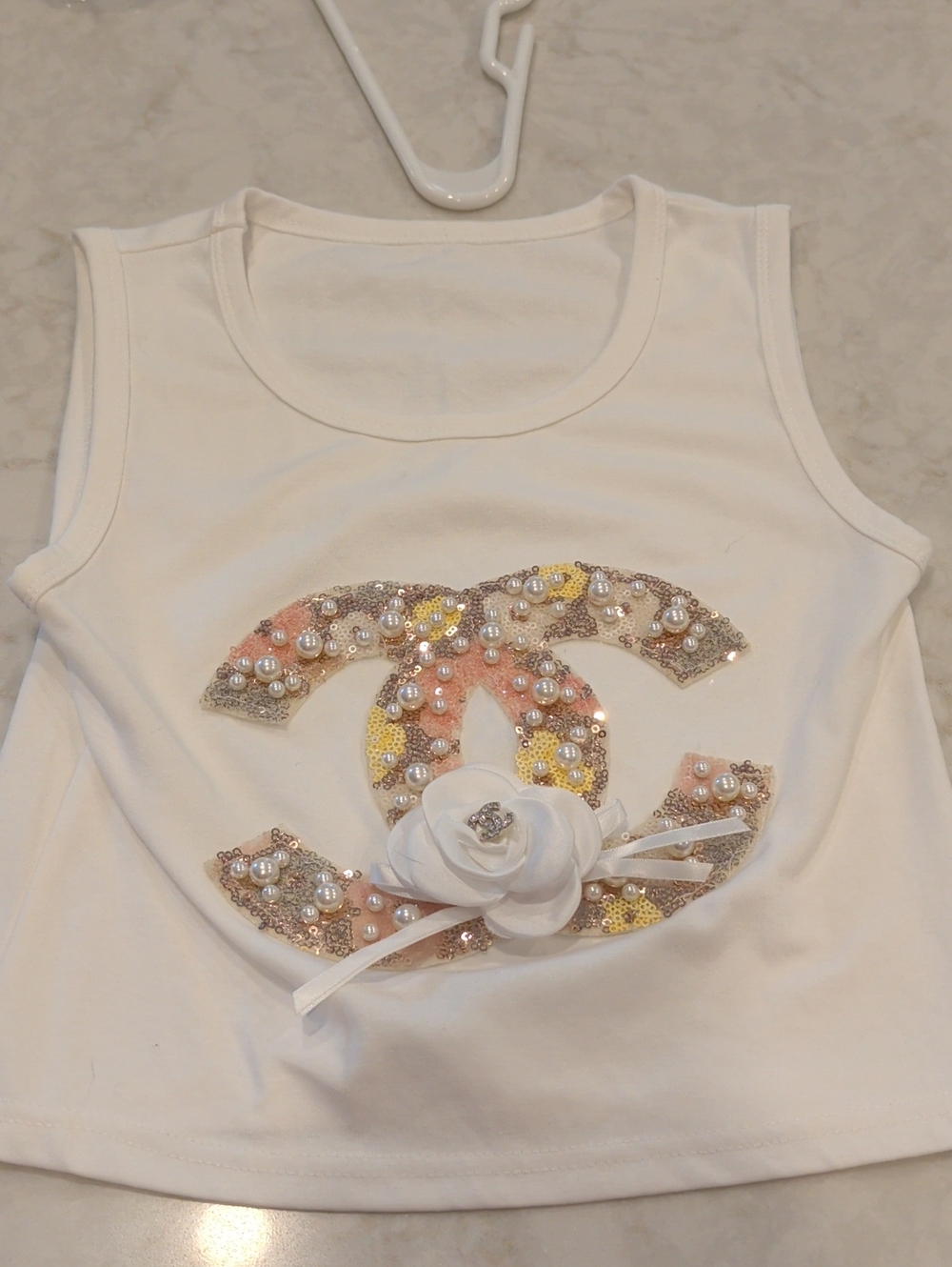 White Embellished Tank Top with Floral Accent